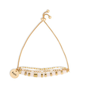 A gold chain adjustable bracelet with beads and tiles in gold and white. The bracelet also has a gold round charm that says Faith.