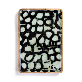 A wood tray with artwork created by ArtLifting artist Linda King. The image is a black background with white painted patches.