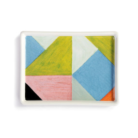 A white ceramic mini tray with artwork created by ArtLifting artist Jeffrey Powers. The image is triangular shapes in shades of blue, green and red.