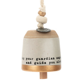 A tan bell with decorative beads and metal token. The bell has a gold rim and an inspirational saying about a guardian angel.