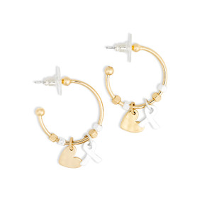 A pair of gold hoop earrings with gold and silver beads and two charms, a gold heart and silver ribbon.
