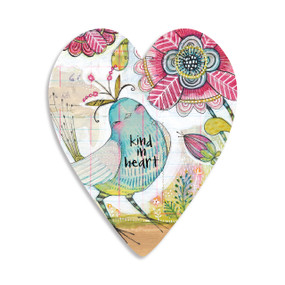 A heart shaped 100 piece puzzle of a pink and blue drawn image of a bird and flowers that says "kind in heart".