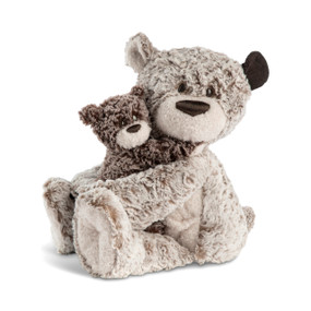 A sitting plush gray bear with a corduroy ear holding a smaller dark gray bear in a hug.