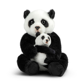 A black and white adult plush panda holding its baby panda in its lap.