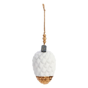 A white pinecone shaped ornament with gold beads at the top and a rim of gold at the bottom. The ornament is a diffuser.