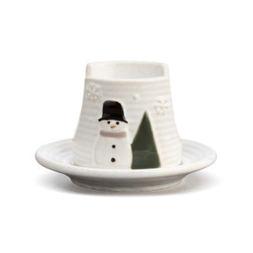 A white stoneware dish with raised sides and a snowman and tree on the exterior.