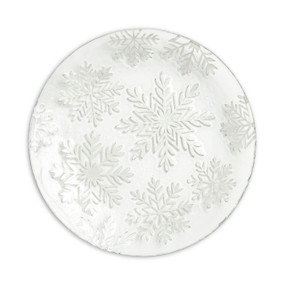 A round glass plate with different patterned embossed snowflakes.