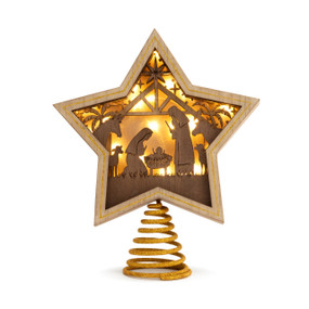 A wood star shaped tree topper with a backlit wood cutout nativity scene.