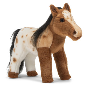 A white and brown Appaloosa plush horse with a black mane and tail, displayed standing angled slightly to the right.