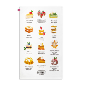 A white kitchen towel with colorful illustrations of a dessert for each calendar month.