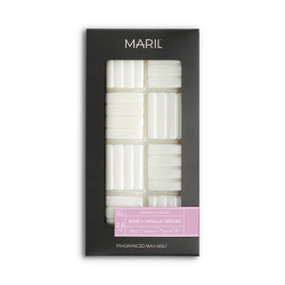 A set of Rosé + Vanilla Orchid white wax melts in a dark gray packaging box.
