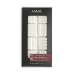 A set of Tobacco + Saffron white wax melts in a dark gray packaging box.