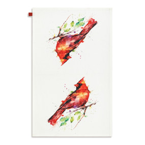 A white kitchen towel with watercolor images of red cardinals, displayed laid out flat.