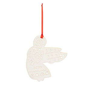 A white mini angel ornament hanging from a red ribbon. The ornament has the saying "love" with decorative holes and images on the ceramic.