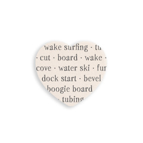 A set of four heart shaped white ceramic coasters with words about water sports on it.