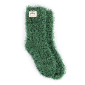 A pair of green fuzzy socks.