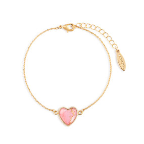 An adjustable gold chain bracelet with a heart shaped charm with pink and gold inside.