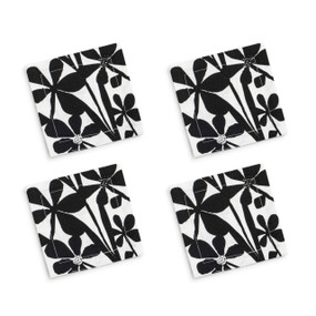 A set of four white cocktail napkins with a bold black floral illustration.