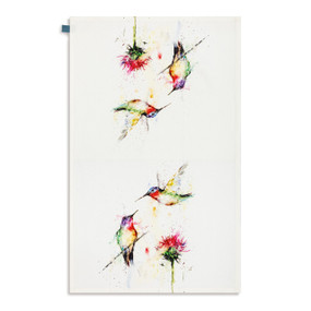 A white kitchen towel with watercolor images of hummingbirds, displayed laid out flat.