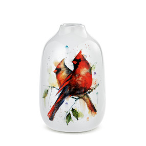 A white ceramic bud vase with a watercolor cardinal pair sitting on a tree branch.