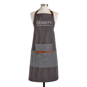 A dark gray apron with a gray houndstooth pocket. The apron says "Grandpa Rules The Grill" and is displayed on a mannequin.