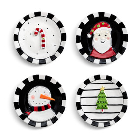 A set of four different appetizer plates in black and white. Each has a different image including a candy cane, Santa, a snowman and a Christmas tree.