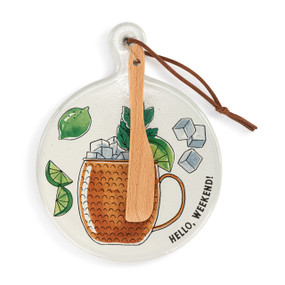 A round ceramic white mini serving board with an illustration of a cocktail and the saying "Hello, Weekend!". The board has a small wood knife attached.