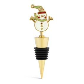 A gold and black bottle stopper with a snowman wearing a scarf and stocking cap on top.