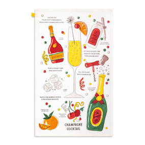 A white kitchen towel with illustrations and directions for making a champagne cocktail, displayed laid out flat.