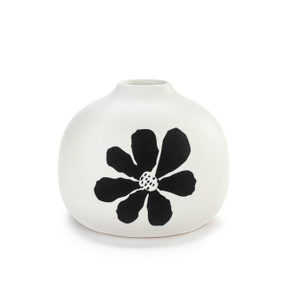 A white ceramic round squat bud vase with a bold black flower on the front.
