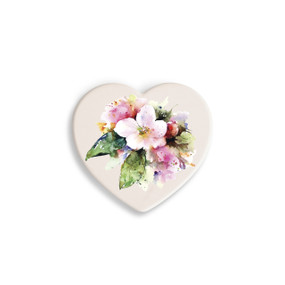 A set of four heart shaped white ceramic coasters with a watercolor image of an apple blossom.