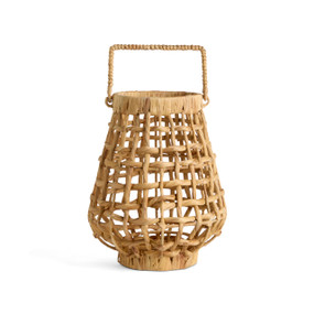 A narrow brown open weave basket in the shape of a lantern with a handle at the top.