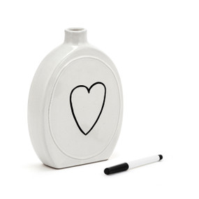 A small white ceramic oval vase with space to write a message. The vase comes with a black write on marker, displayed angled to the right with a heart drawn on the vase.