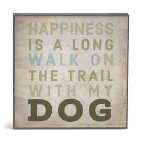 A square brown wall art with the saying "Happiness is a long walk on the trail with my dog".