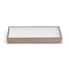 A small white rectangular tray with a tan texture around the outside, displayed at an angle to show depth.