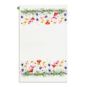 A white kitchen towel with watercolor images of colorful wildflowers, displayed laid out flat.