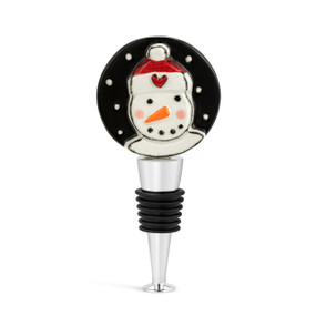 A silver and black bottle stopper with a black ceramic circle on top with a snowman.