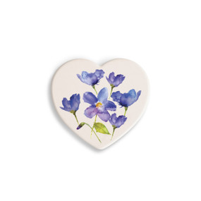 A set of four heart shaped white ceramic coasters with a watercolor image of a violet.