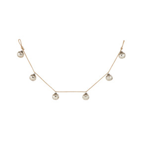 A garland with silver bells spaced apart.