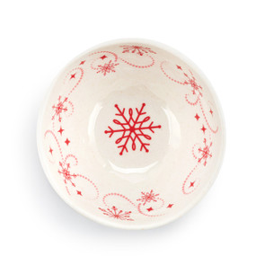A red and white melamine dip bowl. The inside has a red snowflake pattern.