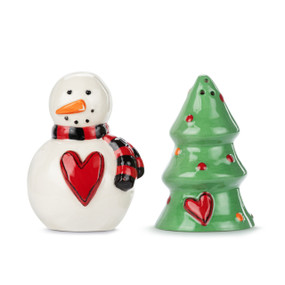 A set of salt and pepper shakers with one shaped like a snowman wearing a red and black scarf and the other shaped like an evergreen tree.