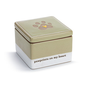 A brown and white square ceramic keepsake box with a lid. The lid has a pawprint and the box says "pawprints on my heart" near the bottom, displayed angled to the right.