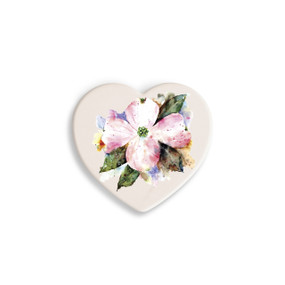 A set of four heart shaped white ceramic coasters with a watercolor image of an American dogwood.
