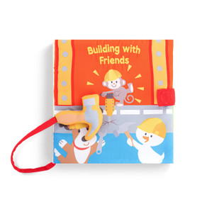 A fabric baby book with sounds called "Building with Friends" with animals as construction workers on the front.