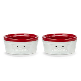 Two white ceramic ramekins with Santa's face on the front and a red rim and interior, displayed angled to show the lip on the inside.