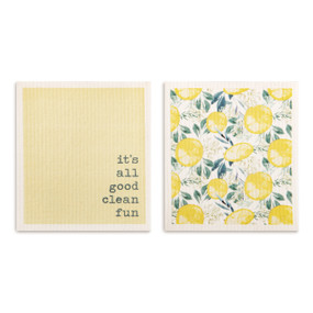 Two yellow biodegradable dish cloths, one has a lemon pattern and one says "it's all good clean fun".