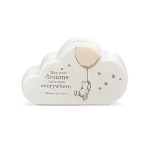 A white ceramic cloud shaped bank that says "May your dreams take you everywhere" with an image of Pooh hanging from a balloon.