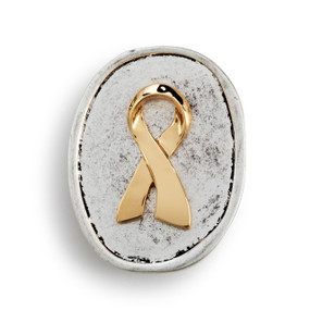 An oval silver metal token with a gold metal ribbon on it.