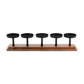 A candle holder for five candles. The base is wood with five iron stands and bases on top.