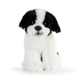 A white and black Havanese plush sitting down.
